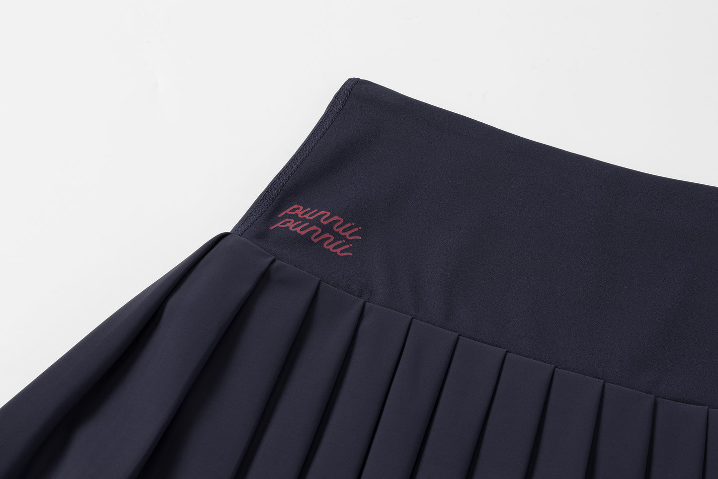 High-waisted pleated mini skirt (navy blue)