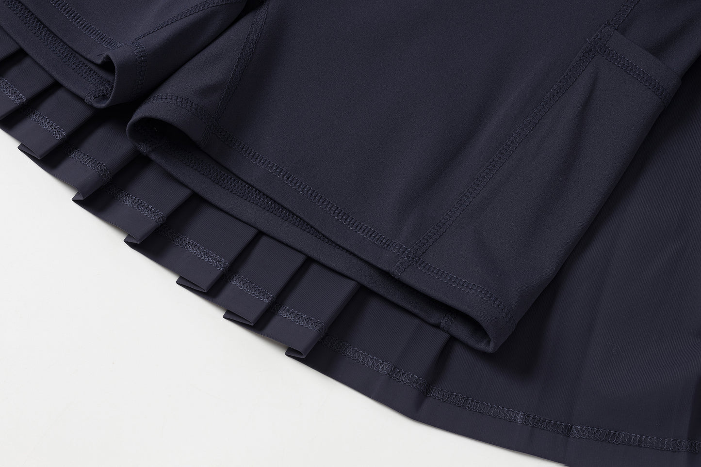 High-waisted pleated mini skirt (navy blue)